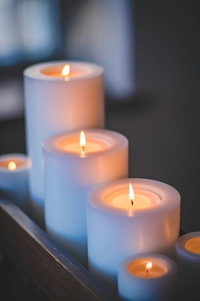 A close-up of a serene candlelight arrangement with a soft, soothing glow.
